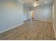 Bright, spacious bedroom with modern ceiling fan and light hardwood floors at 351 Groveland Rd, Mount Dora, FL 32757