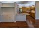 Beautiful kitchen with wood cabinetry, granite countertops, and stainless steel appliances at 351 Groveland Rd, Mount Dora, FL 32757
