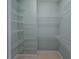 Walk-in closet with custom shelving for optimal storage at 351 Groveland Rd, Mount Dora, FL 32757