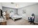 Comfortable bedroom with neutral walls, two windows, ceiling fan, and carpet flooring at 3909 Cr 532A, Bushnell, FL 33513