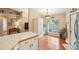 Light-filled entryway with beautiful chandelier, large window, and hardwood floors at 3909 Cr 532A, Bushnell, FL 33513