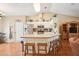 Spacious kitchen features breakfast bar, stainless appliances, and ample cabinet space at 3909 Cr 532A, Bushnell, FL 33513