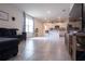 Open-concept living space with view of kitchen, tile flooring, and contemporary decor at 412 Lady Bella Pl, Deland, FL 32724