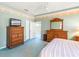 Spacious bedroom with ample storage and a serene atmosphere at 4712 St Andrews Arc, Leesburg, FL 34748