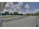 Bocce ball court surrounded by landscaped grounds, providing a relaxing and enjoyable outdoor activity at 4712 St Andrews Arc, Leesburg, FL 34748