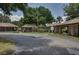 View of the community mailboxes and a picturesque, well-maintained entrance area, creating a welcoming ambiance at 4712 St Andrews Arc, Leesburg, FL 34748