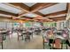Bright dining area with large windows overlooking the landscape, offering a pleasant dining atmosphere at 4712 St Andrews Arc, Leesburg, FL 34748