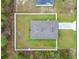Aerial view of a fenced backyard, roof, and surrounding neighborhood at 4923 Sw 166Th Loop, Ocala, FL 34473