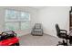 Cozy bedroom with a large window, neutral-toned walls, and ample natural light at 4923 Sw 166Th Loop, Ocala, FL 34473