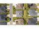 Aerial rooftop view of the home and surrounding neighborhood with manicured lawns at 5978 Conley Ct, The Villages, FL 32163