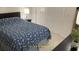Comfortable bedroom with a full bed, ample closet space, and simple decor creating a cozy retreat at 5978 Conley Ct, The Villages, FL 32163