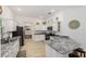 Well-equipped kitchen with stainless steel appliances and a functional layout at 5978 Conley Ct, The Villages, FL 32163