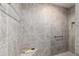 Tile shower with bench seat and built-in niche at 6083 Delphina Loop, The Villages, FL 32163