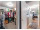 This walk-in closet features shelving and hanging storage space at 710 Dolphin Dr, Tavares, FL 32778