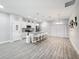 A modern kitchen with stainless steel appliances and granite countertops at 717 Robin Ct, Kissimmee, FL 34759