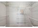 Walk-in closet with extensive shelving at 7729 Lake Andrea Cir, Mount Dora, FL 32757