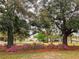 Picturesque front yard featuring lush foliage and a peaceful residential setting at 9113 Sw 91St Court Rd, Ocala, FL 34481