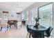 Living area with dining room and access to a bright sunroom at 9113 Sw 91St Court Rd, Ocala, FL 34481