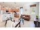 Open concept living room with adjacent kitchen with stainless steel appliances at 9113 Sw 91St Court Rd, Ocala, FL 34481