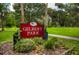 Gilbert Park sign featuring clear signage and lush greenery in the background at 100 S Tremain St # G1, Mount Dora, FL 32757