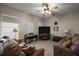 Spacious living room with leather sofas, electric piano, and decorative wall art at 10610 Masters Dr, Clermont, FL 34711