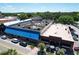 Overhead view of a commercial property with an awning-covered outdoor dining area at 1108 Cedar St, Leesburg, FL 34748