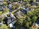 Beautiful aerial shot of a neighborhood with well-maintained lawns and mature landscaping at 114 Cherry Creek Cir, Winter Springs, FL 32708