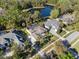 Beautiful aerial shot of homes surrounded by lush greenery at 114 Cherry Creek Cir, Winter Springs, FL 32708