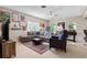 Cozy living room with plush seating, a colorful rug, and ample natural light at 114 Cherry Creek Cir, Winter Springs, FL 32708