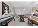 Upstairs living room featuring a shuffleboard and game table at 114 Cherry Creek Cir, Winter Springs, FL 32708