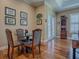 Cozy dining area with hardwood floors and natural light at 1239 Russell Loop, The Villages, FL 32162