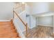 Elegant staircase with wood and white finishes, leading to the upper level of the home at 12620 Bay Breeze Ct, Clermont, FL 34711