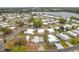 An aerial view of a community near a lake at 1312 Apache Cir, Tavares, FL 32778