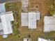 An aerial view of the roof and yard at 1312 Apache Cir, Tavares, FL 32778