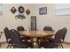 Well-appointed game room features a wooden poker table with comfortable seating at 1312 Apache Cir, Tavares, FL 32778