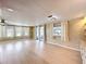 Inviting living space featuring hardwood floors, recessed lighting, and access to an outdoor area at 1312 Apache Cir, Tavares, FL 32778