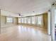 Bright and airy living room with beautiful wood floors and lots of natural light at 1312 Apache Cir, Tavares, FL 32778