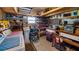 Workshop features shelves, workbench, tools, and a washing machine at 1401 W Highway 50 # 43, Clermont, FL 34711