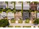 Aerial view of a lovely home with manicured landscaping nestled within a cozy neighborhood at 16721 Se 77Th Northridge Ct, The Villages, FL 32162