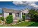 The backyard boasts a comfortable seating area and lush greenery, perfect for outdoor enjoyment at 16721 Se 77Th Northridge Ct, The Villages, FL 32162