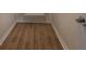 Empty closet with wood-look flooring and wire shelving at 16721 Se 77Th Northridge Ct, The Villages, FL 32162
