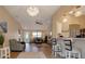 Bright and airy living area with vaulted ceilings and an open layout that seamlessly connects to other rooms at 16721 Se 77Th Northridge Ct, The Villages, FL 32162