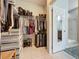 Spacious walk-in closet provides organized storage solutions for clothes, shoes, and accessories at 203 Silver Maple Rd, Groveland, FL 34736