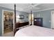 Well-appointed main bedroom with walk-in closet and views to en-suite bathroom at 2068 Darlington Dr, The Villages, FL 32162