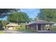 Community ATM building, with lush landscaping and a private setting at 20751 Queen Alexandra Dr, Leesburg, FL 34748