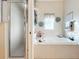 Bright bathroom showcasing a soaking tub, shower and matching decor at 27023 Old English Ct, Leesburg, FL 34748