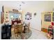 Cozy breakfast nook with a round table, decorative accents, and tile flooring at 27023 Old English Ct, Leesburg, FL 34748