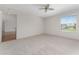 Large bedroom with ceiling fan and window at 2712 Benavides Dr, The Villages, FL 32162