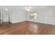 Neutral living room offering laminate floors and natural light at 2712 Benavides Dr, The Villages, FL 32162