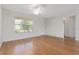 Neutral living room offering laminate floors and natural light at 2712 Benavides Dr, The Villages, FL 32162